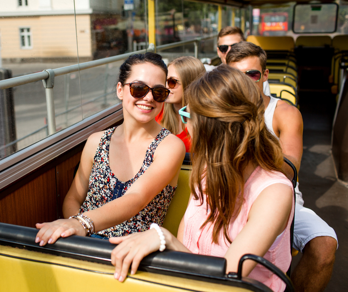 Friends Traveling by Tour Bus